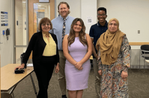 Jacob appears with students presenters and other writing program faculty at George Washington University's University Writing and Research Conference